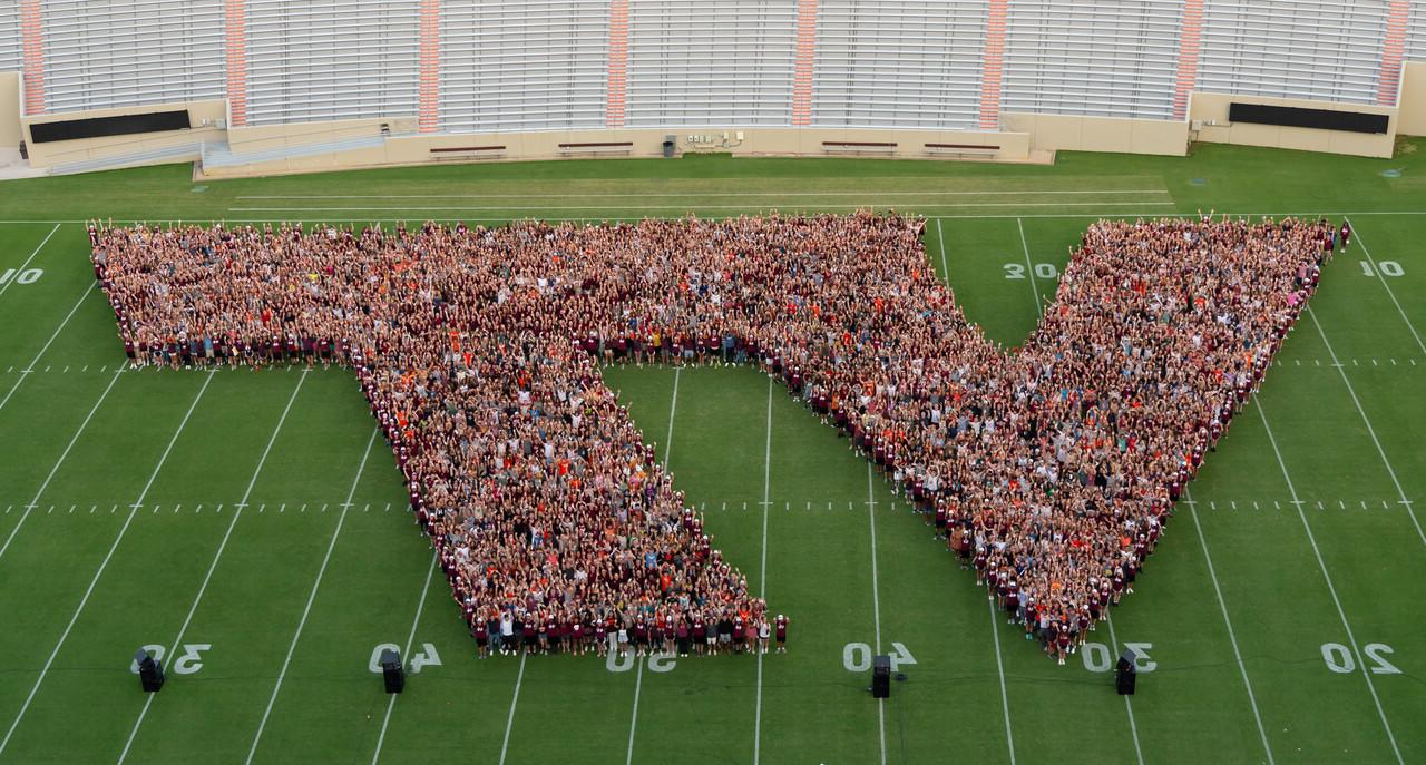 Seen from above, members of the Class of 2027 form a giant "VT" on Worsham Field.